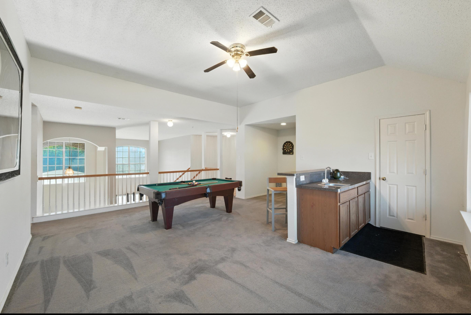 525 Magnolia Trl – Game Room Game Room - Loft photo of 525 Magnolia Trail Desoto, TX. Large island, chef's kitchen, hardwood floors. 2 story, 4 bedroom, media room(optional 5th bedroom), game room loft, 2 primary suites.