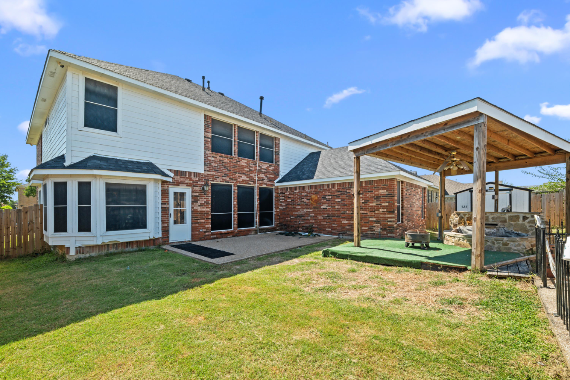 525 Magnolia Trl. – Backyard Entertainment Area Backyard Entertainment photo of 525 Magnolia Trail Desoto, TX. Large island, chef's kitchen, hardwood floors. 2 story, 4 bedroom, media room(optional 5th bedroom), game room loft, 2 primary suites.