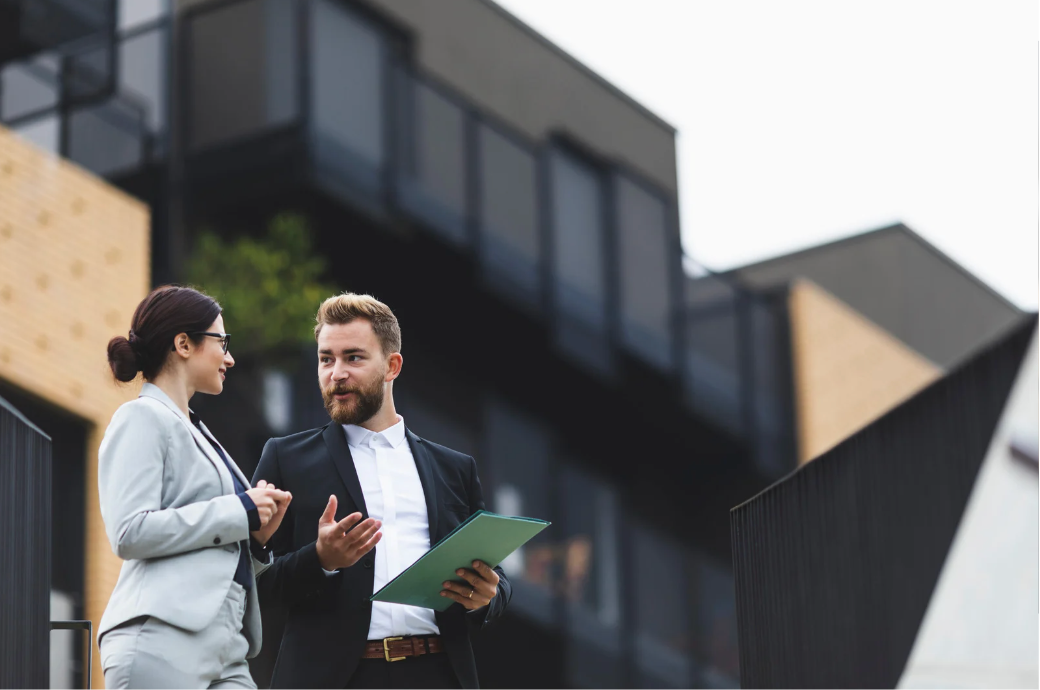 Real estate agent consulting with a buyer
