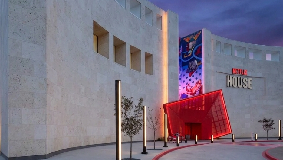 Netflix House officially opened on December 11, 2025, occupying more than 100,000 square feet with permanent immersive experiences built around Stranger Things, Squid Game, Wednesday, One Piece, and A Knives Out Mystery. This isn’t a pop-up. This isn’t a rotating exhibit. It’s a permanent, ticketed destination experience in a format that only exists in two places on the planet right now, Dallas and King of Prussia, Pennsylvania, with Las Vegas planned for 2027 according to Axios Dallas.
